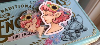 A vinyl sticker of a pink haired, elf earred girl wearing a flower crown.